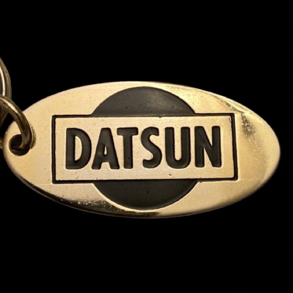 Vintage Datsun Metal Keychain
